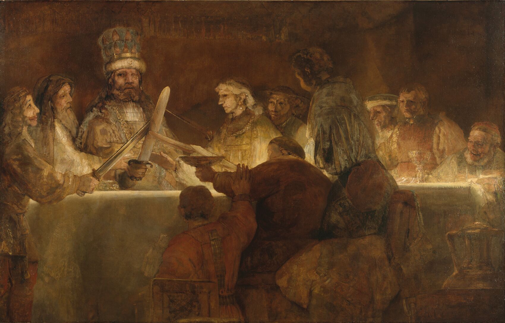 A group of people sitting around a table, raising their swords.